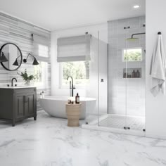 a bathroom with marble floors and white walls