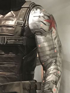 the armor worn by captain america has red spots on it's chest and arms