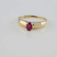 10K Yellow Gold 1/2ct + Ruby Ring, oval 5.8 x 4mm faceted red stone dome top, Ring size 7 3/4, Circa 1960, 1.94 grams SKU# BB280R07 This listing contains photographs of the actual item you will receive. Our items are in excellent condition with little or no signs of wear and many are one of a kind pre-owned estate finds. Please look closely at the pictures in this listing as they are part of the product description. Please read the description, as any imperfections or condition comments will be Classic 14k Gold Sapphire Oval Cabochon Ring, Classic Red Ruby Ring With Oval Cabochon, Classic Red Ruby Ring, Oval Cabochon, Classic Oval Sapphire Ring, Formal Red Domed Rings, Red Domed Gemstone Rings, Classic Sapphire Ring Oval Cabochon, Oval Gemstone Dome Ring In Yellow Gold, Classic Oval Cabochon Sapphire Ring For Anniversary