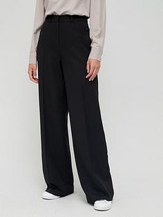 V by Very Tall Wide Leg Trouser Size & Fit True to size - order your usual size Flared wide leg High-rise waist Inside leg: 84cm Specially cut for Tall Details Tall Wide Leg Trouser from V by Very Black The perfect work-to-weekend trouser Loose wide leg skims your pins for both a flattering fit and comfortable wear Handy side pockets Zip and hook fastening Finished with belt loops Switch up your office shoes for cool sneakers Material Material Content: 78% Polyester, 17% Viscose, 5% Elastane Was Office Trousers Women, Clothing Texture, Work Vibes, Teacher Fits, Cool Sneakers, Work Uniform, Black Wide Leg Trousers, Wardrobe Update, Office Shoes