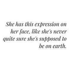 an image with the words she has this expression on her face, like she's never quite sure she's supposed to be on earth