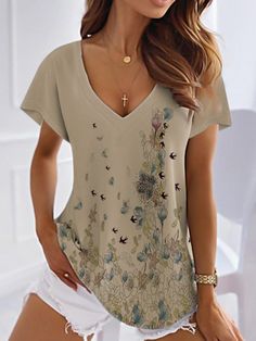 Product Title :Summer Floral V Neck Casual T-ShirtSize Guide (CM) Tag size US Waist Length Shoulder Bust S 6-8 65 64.5 90 M 10 66.5 66.5 94 L 12 68 69.5 100 XL 14 69.5 72.5 106 XXL 16 71 75.5 112 Size Guide (Inch) Tag size US Waist Length Shoulder Bust S 6-8 25.6 25.4 35.4 M 10 26.2 26.2 37 L 12 26.8 27.4 39.4 XL 14 27.4 28.5 41.7 XXL 16 28 29.7 44.1 Product Details Clothes Length: Regular Sleeve Length: Short sleeve Edition type: Regular Fit Waistlines: Natural Elasticity: No Elasticity Silhoue V-neck T-shirt For Summer Vacation, Beige V-neck Summer Top, Beige V-neck Shirt For Summer, Casual Sleeveless Summer T-shirt, Relaxed Fit V-neck Short Sleeve Top For Summer, Beige Graphic Print Shirt For Summer, Beige Shirt With Graphic Print For Summer, Cotton V-neck Summer Top, Cotton V-neck Summer Shirt