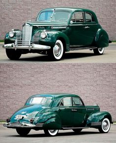 an old green car is parked in front of a brick wall and side by side