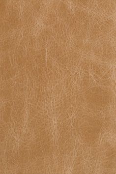 a brown leather textured background that looks like it could be used as a wallpaper