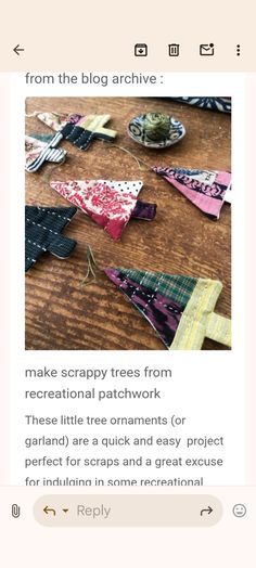 an image of a wooden table with many pieces of fabric on it and the words make scrappy trees from recreational patchwork