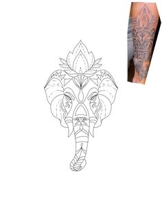 an elephant's head is shown with tattoos on it