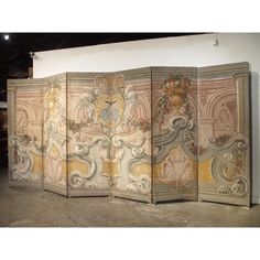 four paneled screen with an ornate design