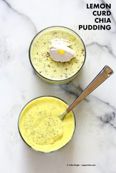 two bowls filled with lemon curd next to each other on a marble counter top