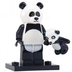 a lego panda bear and its baby are standing next to each other