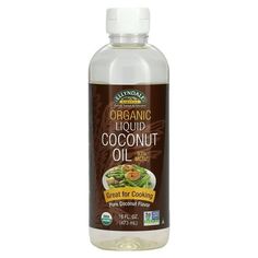 a bottle of coconut oil on a white background