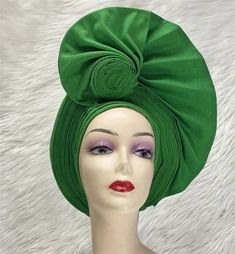 This Sego Gele Headtie Turbans for Women Hats is a must-have for any fashionista. It is made from 100% cotton and features an embroidered design. The width is 1 and it is eco-friendly. It is made in Guangdong, Mainland China. This headtie is already made and ready to wear. It is perfect for any special occasion or just to add a touch of style to your everyday look. It is sure to make a statement and turn heads wherever you go. This Sego Gele Headtie Turbans for Women Hats is a great way to add a Turbans For Women, Mermaid Sequin Dress, Waist Trainer Cincher, Women Hats, Aso Oke, Full Body Suit, Turban Headwrap, Design Dresses, Blue Peach