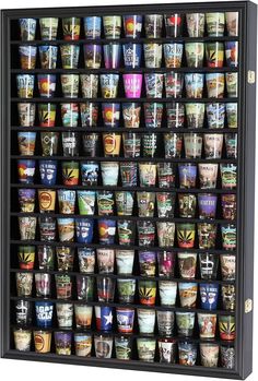 a large display case filled with lots of different types of cups on it's sides