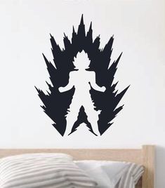 a wall sticker with the silhouette of a person surrounded by trees