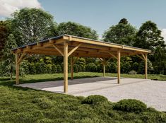 a wooden pavilion in the middle of a grassy area