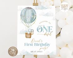 a birthday card with a hot air balloon on it and the words, first birthday party