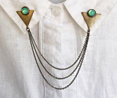 These collar pins are absolutely beautiful and unique and can turn a normal collared shirt into a fashion statement.  These particular pins are made of antique brass triangles with small glass green opal stones set in them. they are both connected by 3 antique brass chains. the shortest chain is 12cm and the longest is 16cm.   See what other unique pieces I have in my shop: www.etsy.com/shop/alapopjewelry By purchasing this item you agree that you have read and accepted my shop policies : https://www.etsy.com/shop/alapopjewelry/policy?ref=shopinfo_policies_leftnav ATTENTION BUYERS FROM OUTSIDE OF THE UNITED STATES:  Please be familiar with your country's customs regulations.  Sometimes there are fees imposed by your country's government for ordering from outside of the country.  Every coun Collar Brooch, Collar Pin, Chain Collar, Sweater Clip, Collar Chain, Collar Pins, Miami Wedding, Green Opal, Shoe Clips