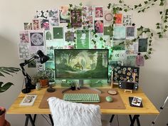 a desktop computer sitting on top of a wooden desk