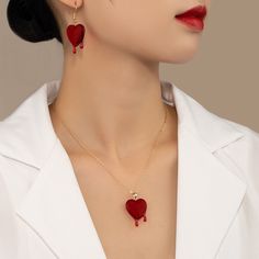 Blood drop red resin heart dripping with 2 droplets of ruby blood Material: Custom handcut resin heart Gold chain with an arrow toggle clasp in front Heart Dripping, Sunglasses Necklace, Blood Drop, Heart Red, G 5, Red Blood, An Arrow, Jewelry Accessories Ideas, Ring Bag