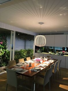 the dining room table is set with plates and place settings for eight people to eat