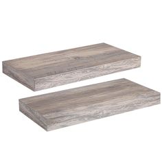 two pieces of wood sitting on top of each other