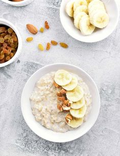 oatmeal with bananas, nuts and raisins in bowls on a table