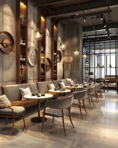 an empty restaurant with tables and chairs lined up against the wall in front of them