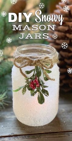 a mason jar filled with snow and christmas decorations