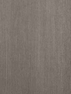 a close up view of the textured surface of a wood paneled wallpaper