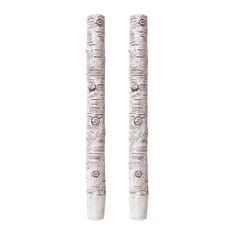 two tall white birch trees standing next to each other on a white background in front of the camera