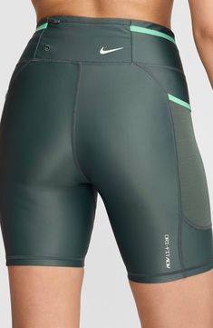 The brand's signature Dri-FIT technology wicks away sweat and keeps you comfortable in these superstretchy bike shorts that move with you from mountain hikes to spin class. Interior drawstring waist Side drop-in pockets; back zip pocket 78% nylon, 22% elastane with 82% polyester, 18% spandex contrast Machine wash, dry flat Imported Nordstrom x Nike: A curated lifestyle destination where fashion is the ultimate sport Functional Green Running Shorts, Compressive Functional Green Athletic Shorts, Technical Athletic Running Shorts, Compressive Sportswear Running Shorts, Technical Moisture-wicking Athletic Shorts For Running, Sporty Dress, Spandex Shorts, Nike Acg, Running Fashion