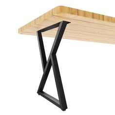 a wooden table with black metal legs and a wood shelf on the top that has an x design