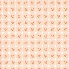 an orange and white checkered fabric with small flowers