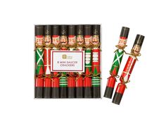 christmas crackers are wrapped in red and green