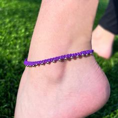 This beautiful anklet is made with wax polyester cord and 14k gold plated beads. Choose the color you would like! If you would like to have two colors in one anklet send me a message and with the requested second color! These come in two sizes-- child size (ranges from apprx. 7in at smallest and 11in at largest) and adult size (ranges from apprx. 9in at smallest and 12in at largest). If you need a different size let me know! The anklet will be made with an adjustable sliding knot. To adjust the Adjustable Purple Anklets, Adjustable Gold Beads Anklets, Adjustable Sliding Knot, Beautiful Anklet, Sliding Knot, Braided Bracelets, Gold Beads, Friendship Bracelets, Anklets