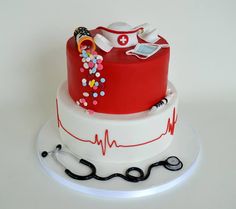 a cake decorated with medical equipment and sprinkles