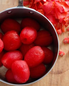 some red food is in a pot on the table