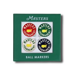 three different colored stickers on a green box with the words masters and ball markers