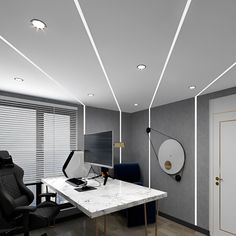 an office with a marble desk and black chairs