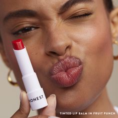 A bestselling, nourishing tinted balm that moisturizes lips all day and provides fresh color. Made with Antioxidant-rich Acai Extracts + Avocado Oil. This vegan lip balm works for all skin types. Lip Balm Photography, Honest Beauty Tinted Lip Balm, Red Lip Balm, Ugc Photos, Spf Lip Balm, Face Kit, Vegan Lip Balm, Honest Beauty, Fresh Color