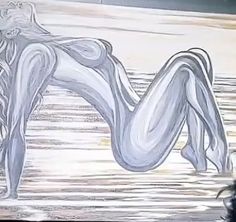 a drawing of a woman laying down in the water