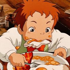 a young boy eating breakfast from a bowl