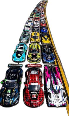 a long line of race cars lined up in the shape of a straight row on top of each other