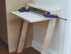 a table with two tools on top of it