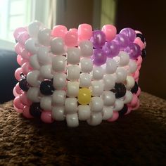 Hello Kitty Kandi Cuff, Kandi Bracelets Ideas Cuffs, Kandi Core, Safety Pin Crafts, Crafting Table, Pin Crafts