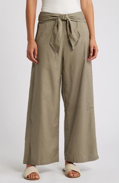 Flowy wide legs punctuate these light and airy pants topped with a drapey tie and a comfy back elastic waist. 29" inseam; 24" leg opening; 11 1/2" front rise; 15 1/2" back rise Attached waist tie Back elastic waist 88% cotton, 12% linen Hand wash, tumble dry Imported Cotton Linen Pants, Wide Legs, Linen Pants, Tie Back, Waist Tie, Bottoms Pants, Cotton Linen, Womens Bottoms, Elastic Waist