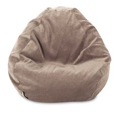 a brown bean bag chair sitting on top of a white floor