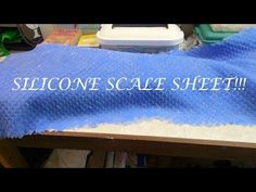 there is a blue sheet that has the words silicone scale sheet on it