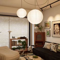 a living room filled with furniture next to a large window covered in white shades and hanging lights