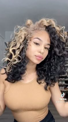 Blond And Brown Curly Hair, Black Hair With Platinum Highlights Curly Hair, Black Hair With Blonde Patch, Curly Hair Peekaboo Highlights, Curly Hair Peekaboo, Skunk Stripe Hair Curly, Blonde Patch Curly Hair, Curly Hair Money Piece, Curly Hair Peekaboo Color