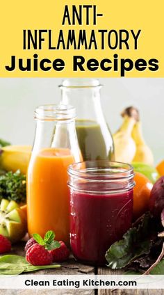 two jars filled with juice sitting on top of a table next to fruit and vegetables